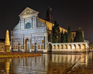 Picture of a basilica at night during rain